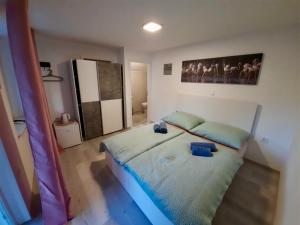 Postel nebo postele na pokoji v ubytování Rooms Optim