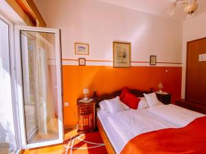 Ein Bett oder Betten in einem Zimmer der Unterkunft Guest House Soši