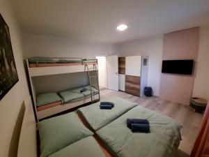 Postel nebo postele na pokoji v ubytování Rooms Optim
