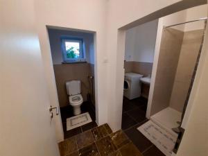 Koupelna v ubytování Rooms Optim + 36 fotografií