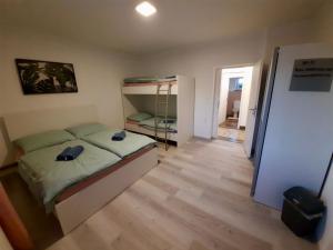 Postel nebo postele na pokoji v ubytování Rooms Optim