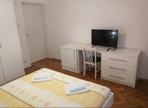 TV a/nebo společenská místnost v ubytování Rooms Beros
