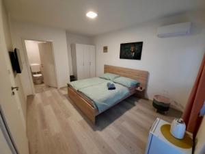 Postel nebo postele na pokoji v ubytování Rooms Optim