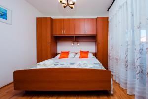 Postel nebo postele na pokoji v ubytování Apartments Valdibora