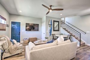 a living room with two couches and a ceiling fan at San Diego Hideout 8 Blocks to Ocean Beach! in San Diego