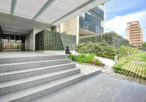 a building with stairs in front of a building at MIRADOR Sea View apartment in Calpe