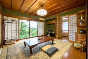 Μια τηλεόραση ή/και κέντρο ψυχαγωγίας στο Tabist Sakura Annex Okumikawa