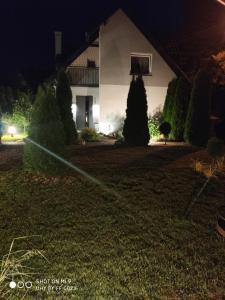 Vonkajšia záhrada v ubytovaní Apartamenty Pod Sosnami Ostróda Międzylesie 6os