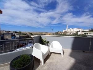 Balkón alebo terasa v ubytovaní AMARE MATERA comfortable rooms