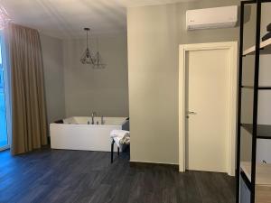 Postel nebo postele na pokoji v ubytování La Terrazza di Parthenope