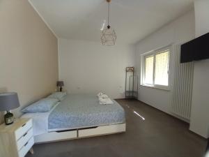 Posteľ alebo postele v izbe v ubytovaní AMARE MATERA comfortable rooms