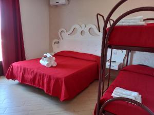 A bed or beds in a room at Tesori del Salento