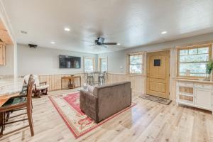 a living room with a couch and a table at Bigfoot's Hideout in Shaver Lake