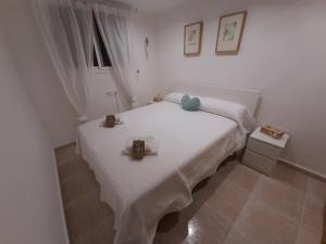 Postel nebo postele na pokoji v ubytování Apartamento Acantilados vistas Mar