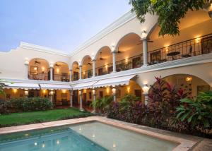 Bazén v ubytování Hotel Posada San Juan nebo v jeho okolí