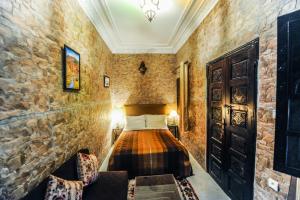 Voodi või voodid majutusasutuse Riad Errabii & Spa toas