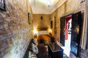 Voodi või voodid majutusasutuse Riad Errabii & Spa toas