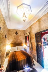 Voodi või voodid majutusasutuse Riad Errabii & Spa toas