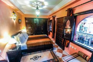 Voodi või voodid majutusasutuse Riad Errabii & Spa toas