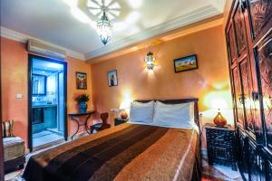Voodi või voodid majutusasutuse Riad Errabii & Spa toas