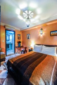 Voodi või voodid majutusasutuse Riad Errabii & Spa toas