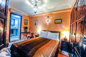 Voodi või voodid majutusasutuse Riad Errabii & Spa toas