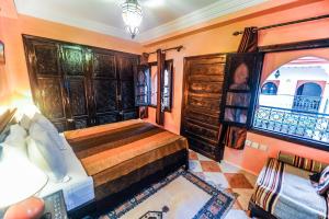 Voodi või voodid majutusasutuse Riad Errabii & Spa toas