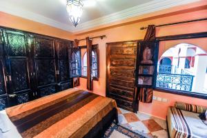 Voodi või voodid majutusasutuse Riad Errabii & Spa toas