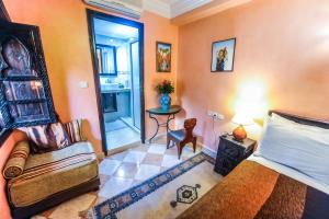 Voodi või voodid majutusasutuse Riad Errabii & Spa toas