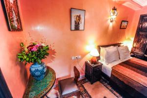 Voodi või voodid majutusasutuse Riad Errabii & Spa toas