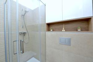 Ένα μπάνιο στο Exclusive Residence Apartment +44 φωτογραφίες
