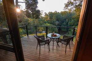 
A balcony or terrace at Whispering Valley Cottage Retreat
