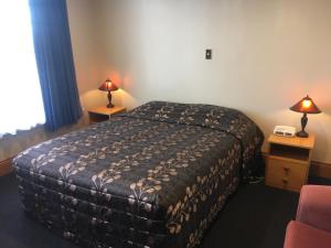 Säng eller sängar i ett rum på Leviathan Hotel