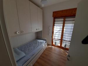 Posteľ alebo postele v izbe v ubytovaní Casa Stella Marina