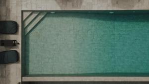 a glass window on the side of a building at Casa Costa Suites in Kanali