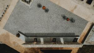an overhead view of a stone counter with some tomatoes on it at Casa Costa Suites in Kanali