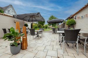 Patio nebo venkovní prostory v ubytování De Zonnetuin