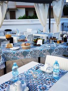 a table with plates of food on top at AL VECCHIO FRANTOIO in Manduria