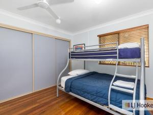 
A bunk bed or bunk beds in a room at Hastings Point Holiday Heaven
