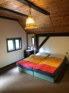 Tempat tidur dalam kamar di Apartmany Slavkovice-Lipno