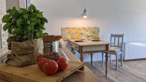 a living room with a table with tomatoes on a table at SonnenStrahl in Todtmoos +16 photos