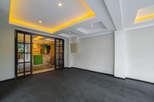 Foto de la galeria de Tree Homestay Mitra RedDoorz a Kasri