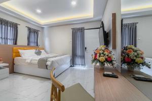 Ruang duduk di Tree Homestay Mitra RedDoorz