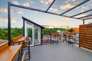 Balcó o terrassa a Tree Homestay Mitra RedDoorz