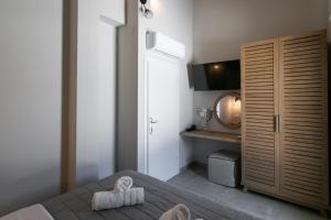 Телевізор і / або розважальний центр в The Euphoria Club Luxury Villas