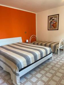 A bed or beds in a room at Domus Anxur