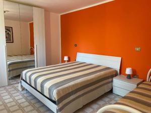 A bed or beds in a room at Domus Anxur