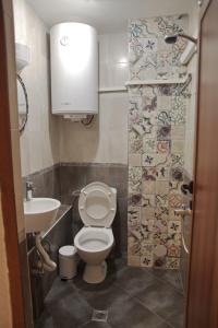 Vonios kambarys apgyvendinimo įstaigoje Interhost Guest rooms and apartments