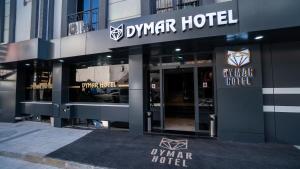 ein Gebäude mit Eingang zu einem Luxushotel in der Unterkunft DYMAR HOTEL in Istanbul