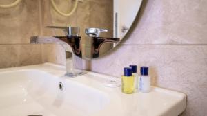 Koupelna v ubytování DYMAR HOTEL